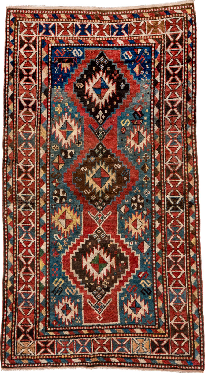 3' x 7' one-of-a-kind handmade vintage Kazak rug. Color palette: arapawa, blue, brown, gray, pink, red, redwood