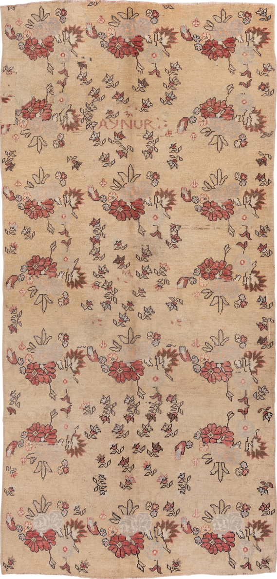 5' x 11' one-of-a-kind handmade vintage Konya runner rug. Color palette: brown, gray, off-white, orange, pink, red, tan