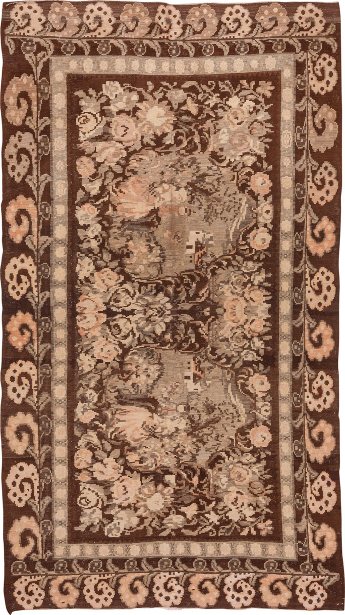 5' x 10' one-of-a-kind handmade vintage Kilim medium size rug. Color palette: brown, off-white, orange