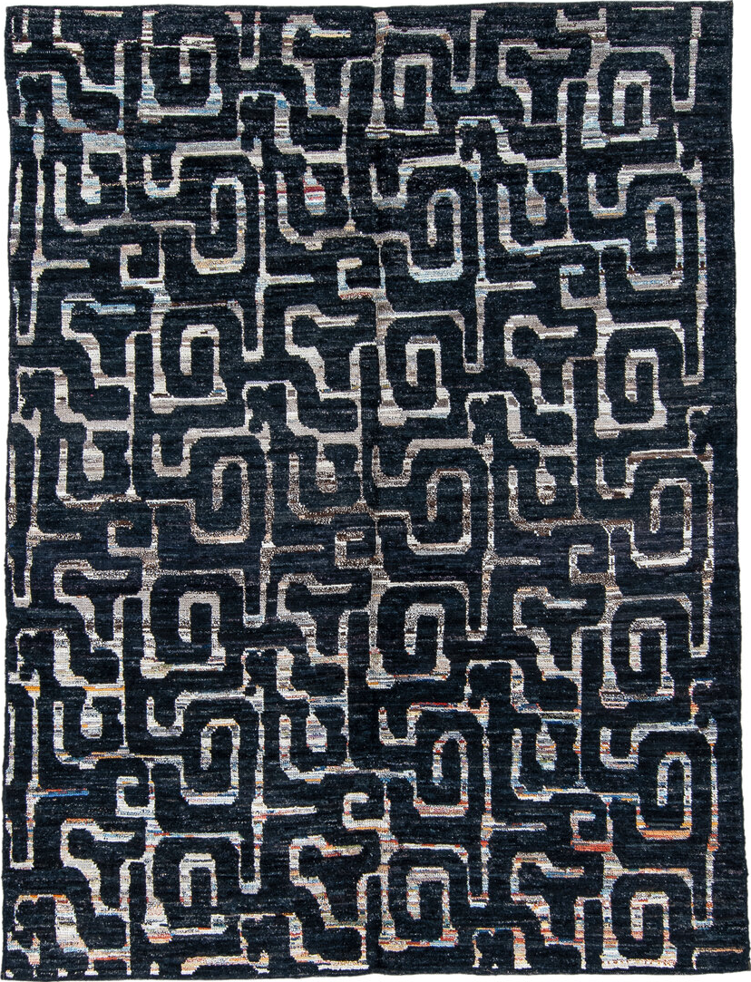 6' x 8' one-of-a-kind handmade vintage Tulu medium size rug. Color palette: black, blue, brown, charcoal, dark gray