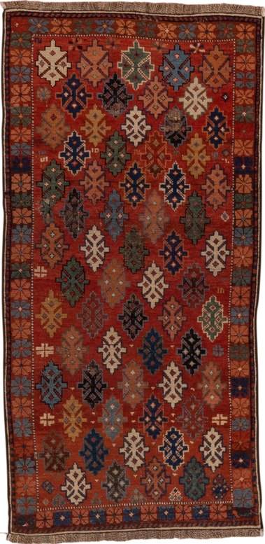 2' x 4' one-of-a-kind handmade vintage Shirvan small size rug. Color palette: black, brown, gray, pink, red