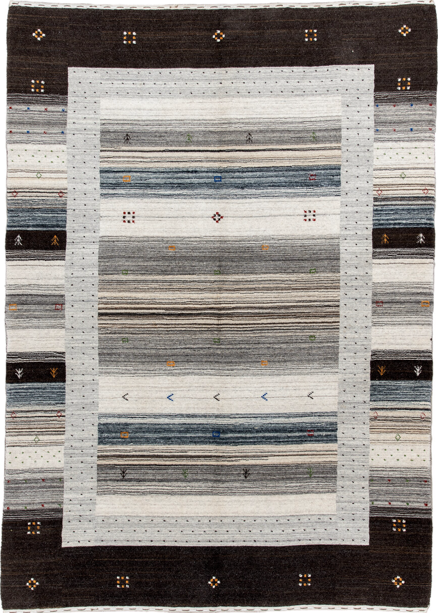 5' x 7' one-of-a-kind handmade vintage Gabbe rug. Color palette: black, blue, brown, charcoal, dark gray, dim gray