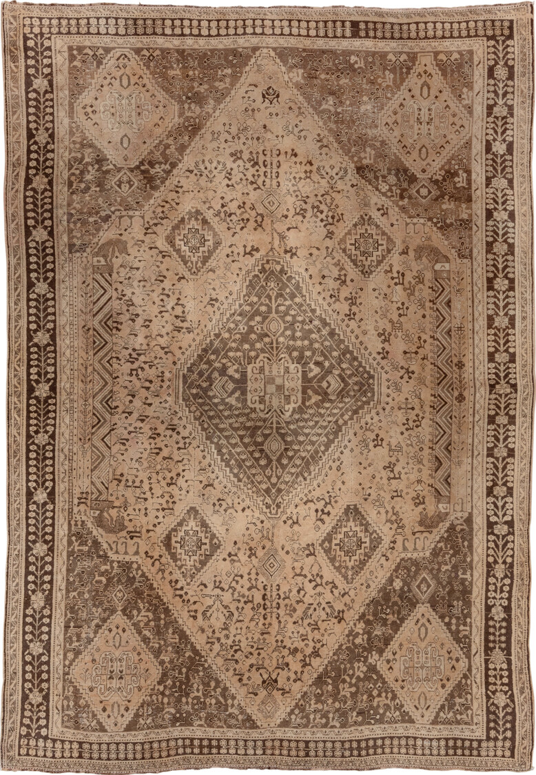 6' x 9' one-of-a-kind handmade vintage Shiraz medium size rug. Color palette: brown