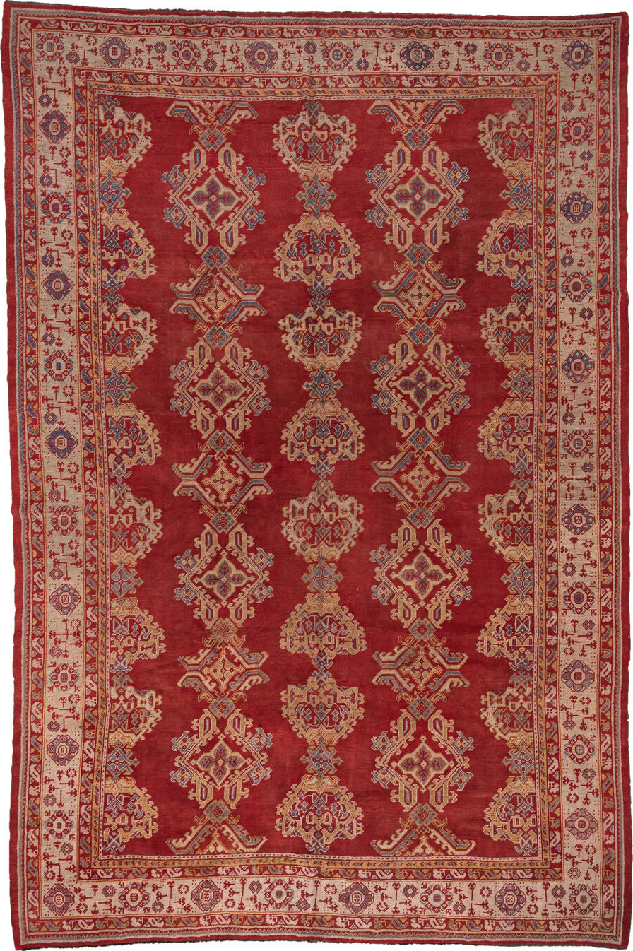10' x 15' one-of-a-kind handmade vintage Oushak rug. Color palette: brown, gray, pink, red