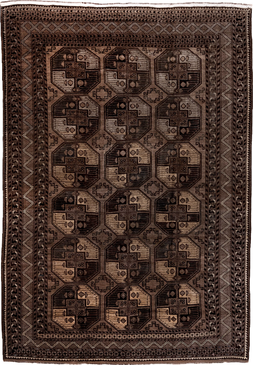 7' x 10' one-of-a-kind handmade vintage Afghan large size rug. Color palette: black, brown, gray, light gray, off-white