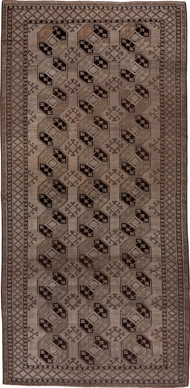 7' x 15' one-of-a-kind handmade vintage Afghan rug. Color palette: black, brown, gray, light gray, pink
