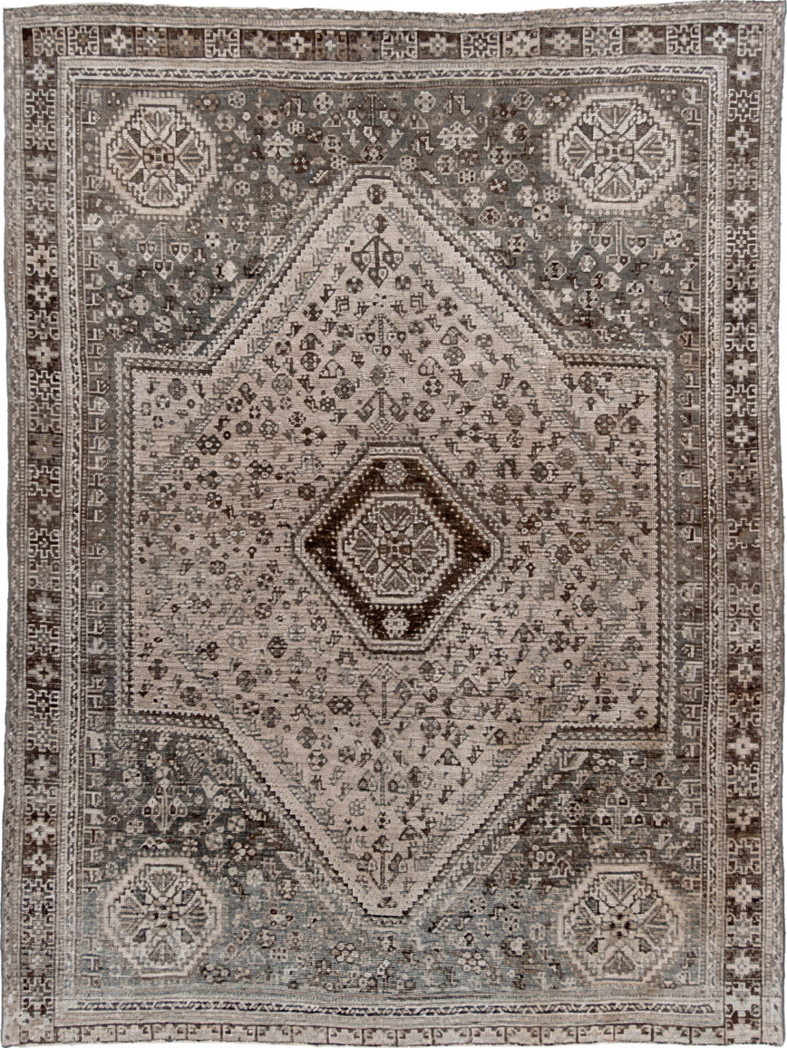 7' x 9' one-of-a-kind handmade vintage Shiraz rug. Color palette: black, brown, charcoal, dark gray, gray, light gray
