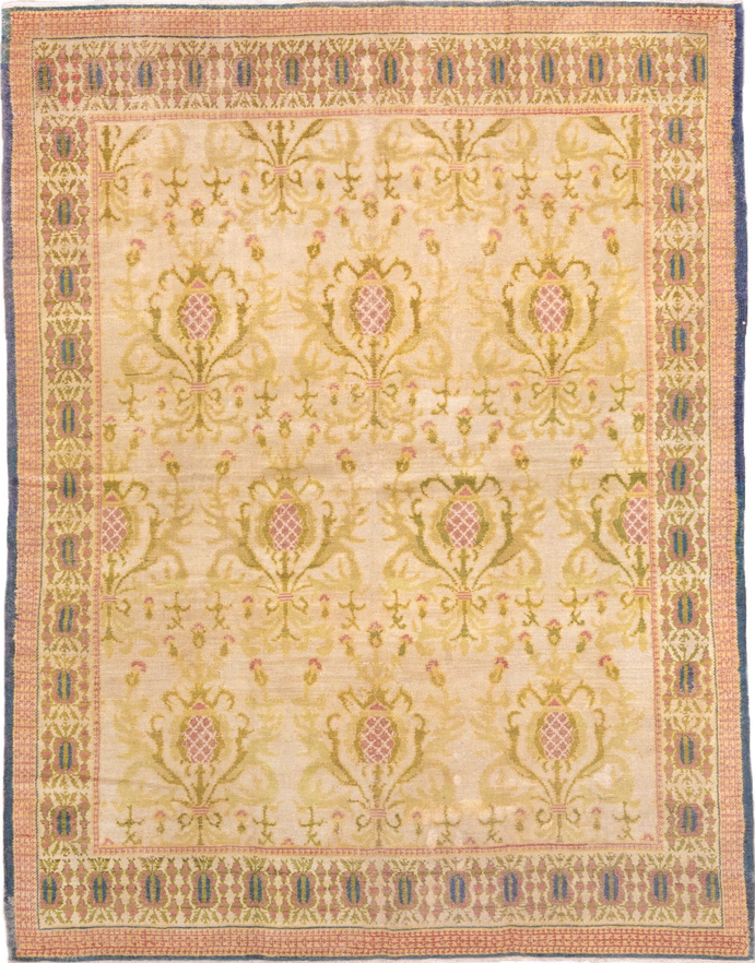 5' x 7' one-of-a-kind handmade vintage Spanish rug. Color palette: brown, gray, navajo white, off-white, orange, peach puff