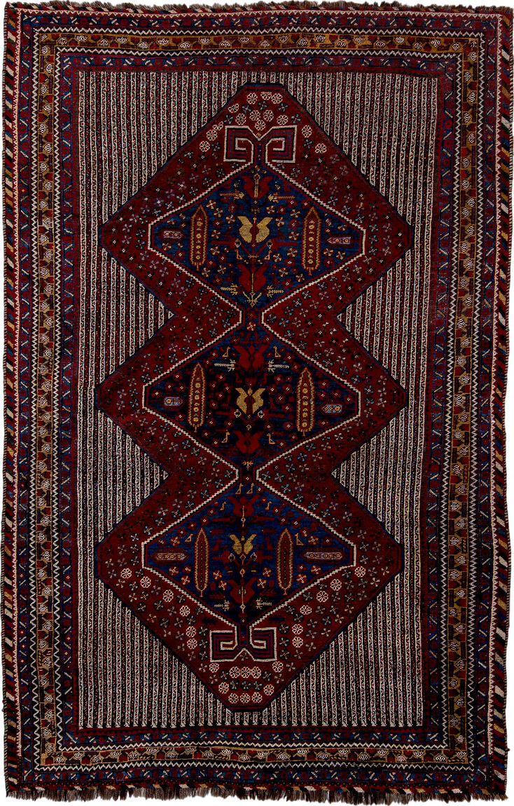 5' x 8' one-of-a-kind handmade vintage Qashqai medium size rug. Color palette: blue, brown, gray, light gray, off-white
