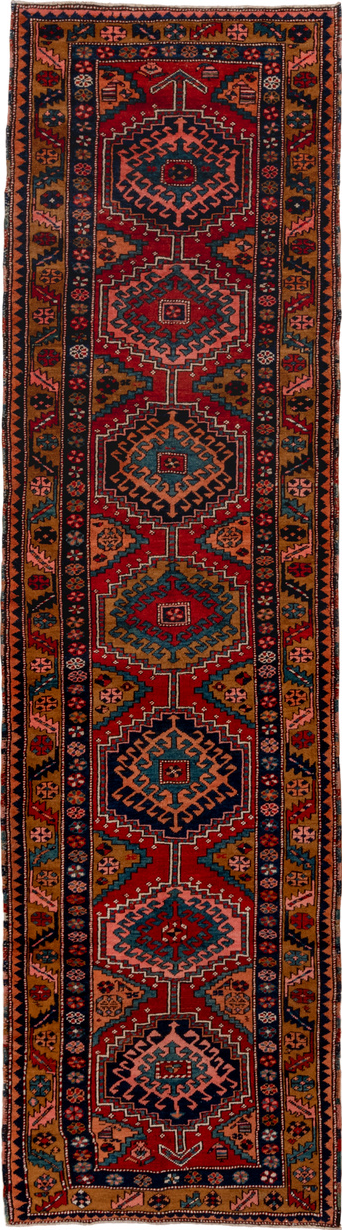 3' x 12' one-of-a-kind handmade vintage Heriz runner rug. Color palette: black, blue, brown, gray, maroon, pink, red