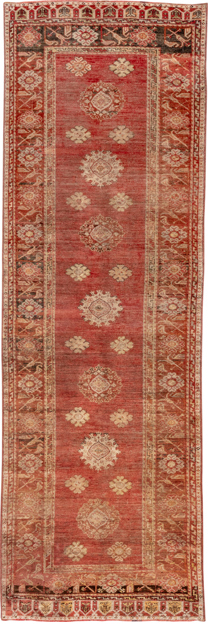 4' x 12' one-of-a-kind handmade vintage Oushak runner rug. Color palette: brown, maroon, pink, red
