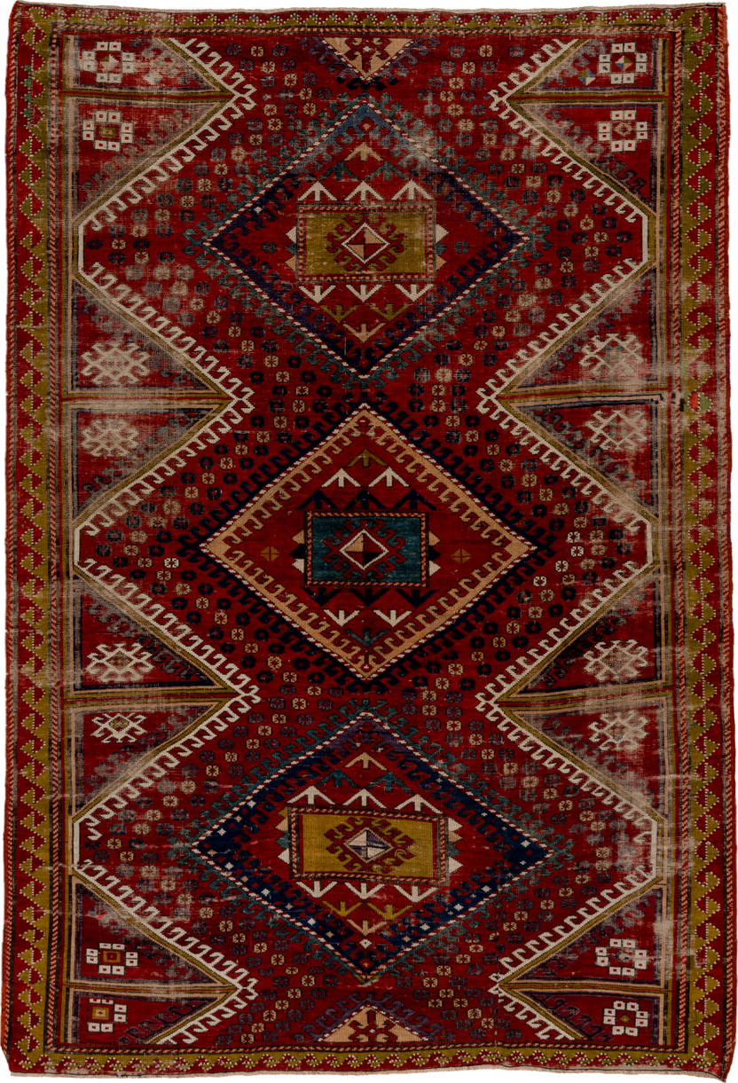 5' x 7' one-of-a-kind handmade vintage Kazak rug. Color palette: black, brown, gray, red, redwood