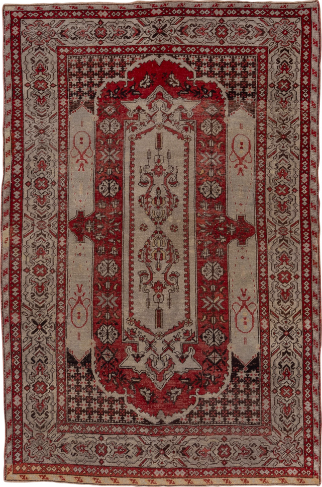 4' x 7' one-of-a-kind handmade vintage Oushak rug. Color palette: brown, gray, pink, red, redwood