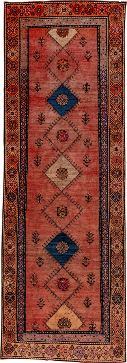 4' x 12' one-of-a-kind handmade vintage Oushak runner rug. Color palette: black, blue, brown, gray, pink, red