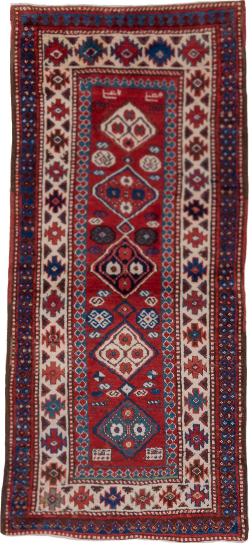 3' x 8' one-of-a-kind handmade vintage Kazak runner rug. Color palette: arapawa, blue, brown, fiord, gray, pink, red
