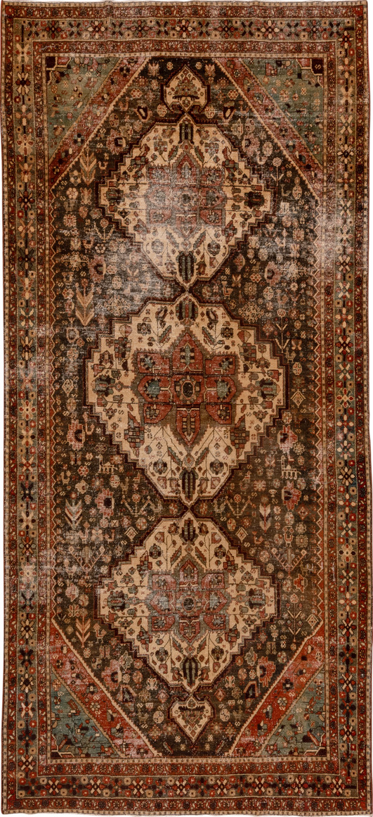 5' x 12' one-of-a-kind handmade vintage Baktiary rug. Color palette: brown, red
