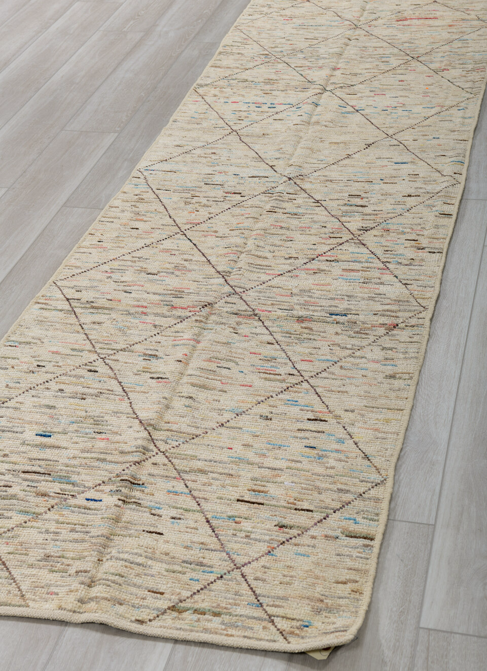 2' x 10' one-of-a-kind handmade vintage Tulu runner rug. Color palette: blue, brown, gray, light gray, off-white, pink