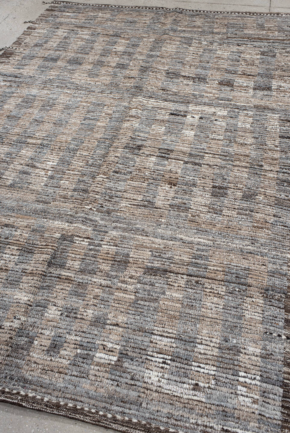 6' x 9' one-of-a-kind handmade vintage Tulu medium size rug. Color palette: black, brown, dark gray, dim gray, gray