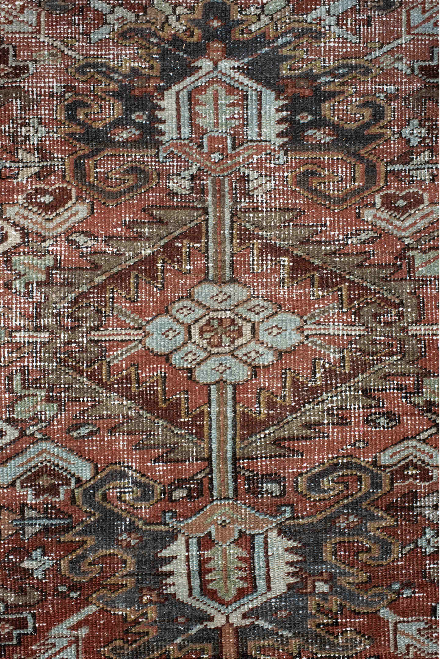 7' x 9' one-of-a-kind handmade vintage Heriz rug. Color palette: brown, gray, pink, light gray, off-white, black, blue