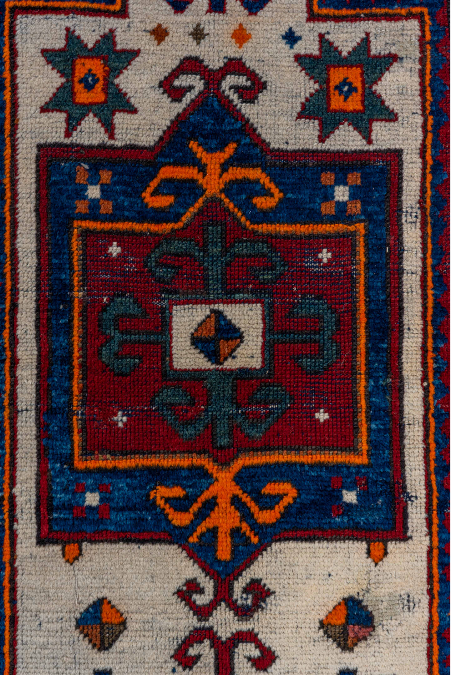 3' x 4' one-of-a-kind handmade vintage Kazak small size rug. Color palette: brown, gray, pink, red