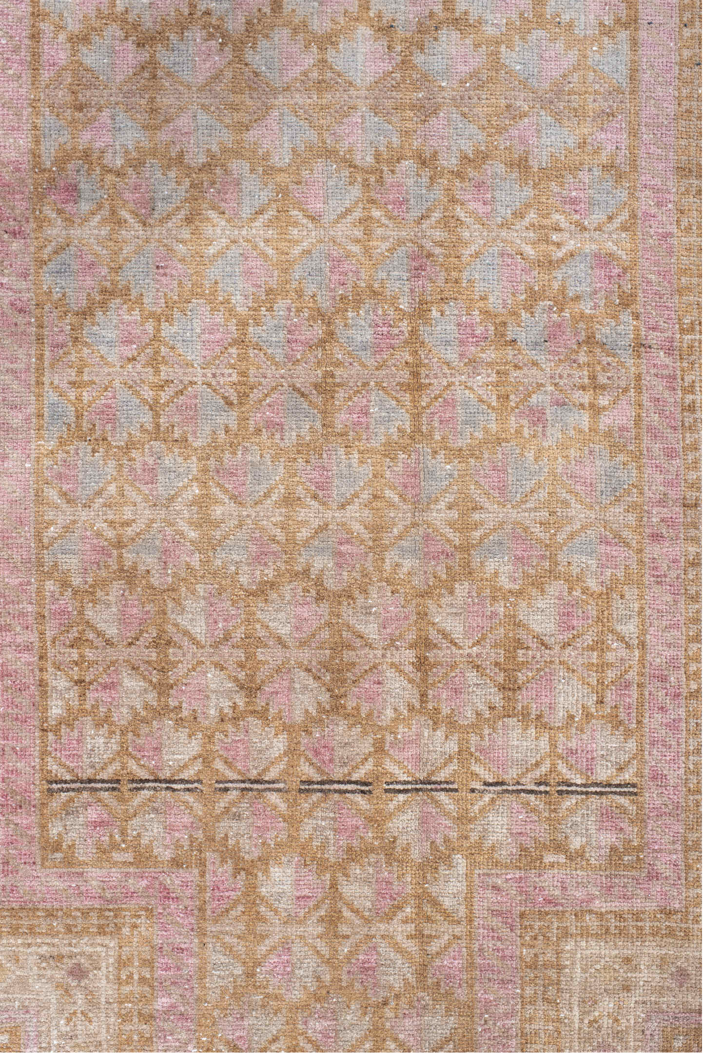 2' x 4' one-of-a-kind handmade vintage Belouch small size rug. Color palette: gray, light gray, off-white, pink, brown