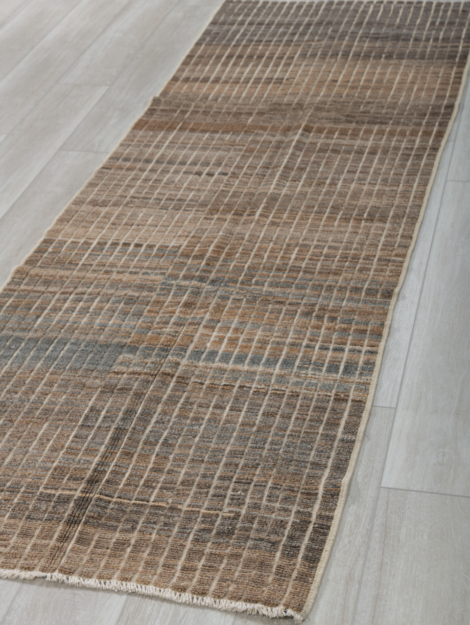 3' x 9' one-of-a-kind handmade vintage Tulu runner rug. Color palette: brown, dark gray, gray, light gray, off-white, silver