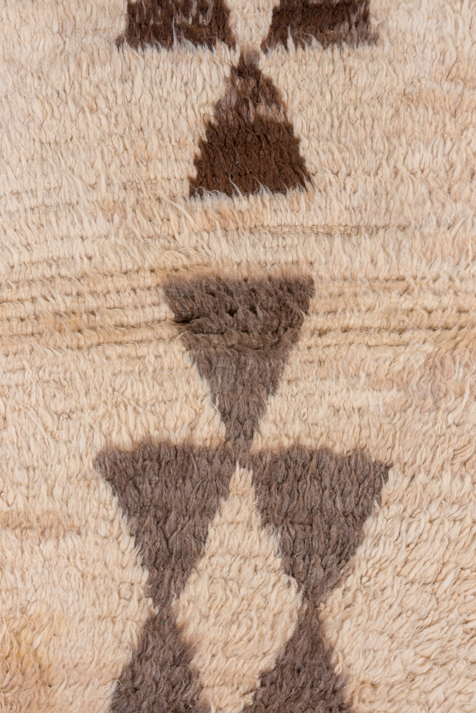 2' x 5' one-of-a-kind handmade vintage Moroccan small size rug. Color palette: brown, off-white, orange, pink, gray