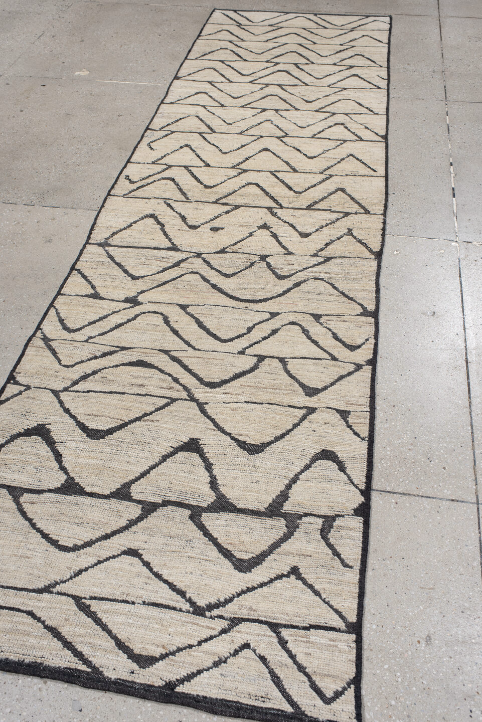 2' x 10' one-of-a-kind handmade vintage Tulu runner rug. Color palette: gray, light gray, off-white, black, pink, dim gray