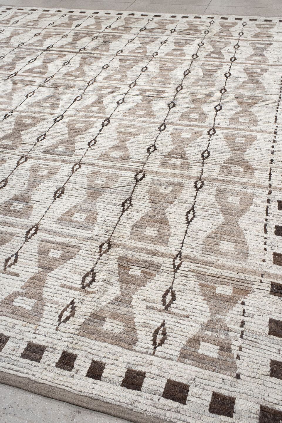 12' x 14' one-of-a-kind handmade vintage Tulu oversize rug. Color palette: dark gray, floral white, gray, light gray, linen