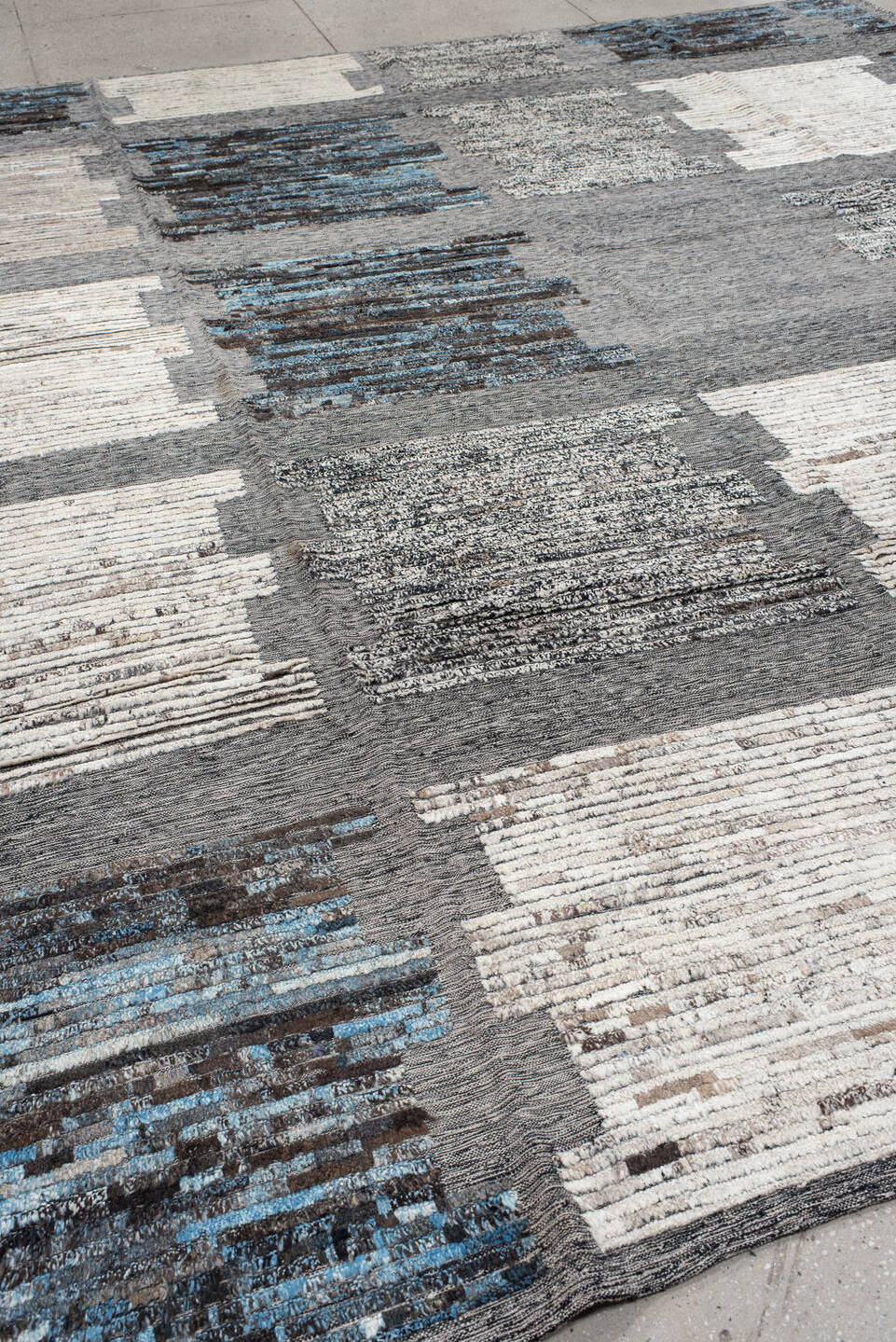 11' x 12' one-of-a-kind handmade vintage Tulu oversize rug. Color palette: black, blue, charcoal, dark gray, dim gray