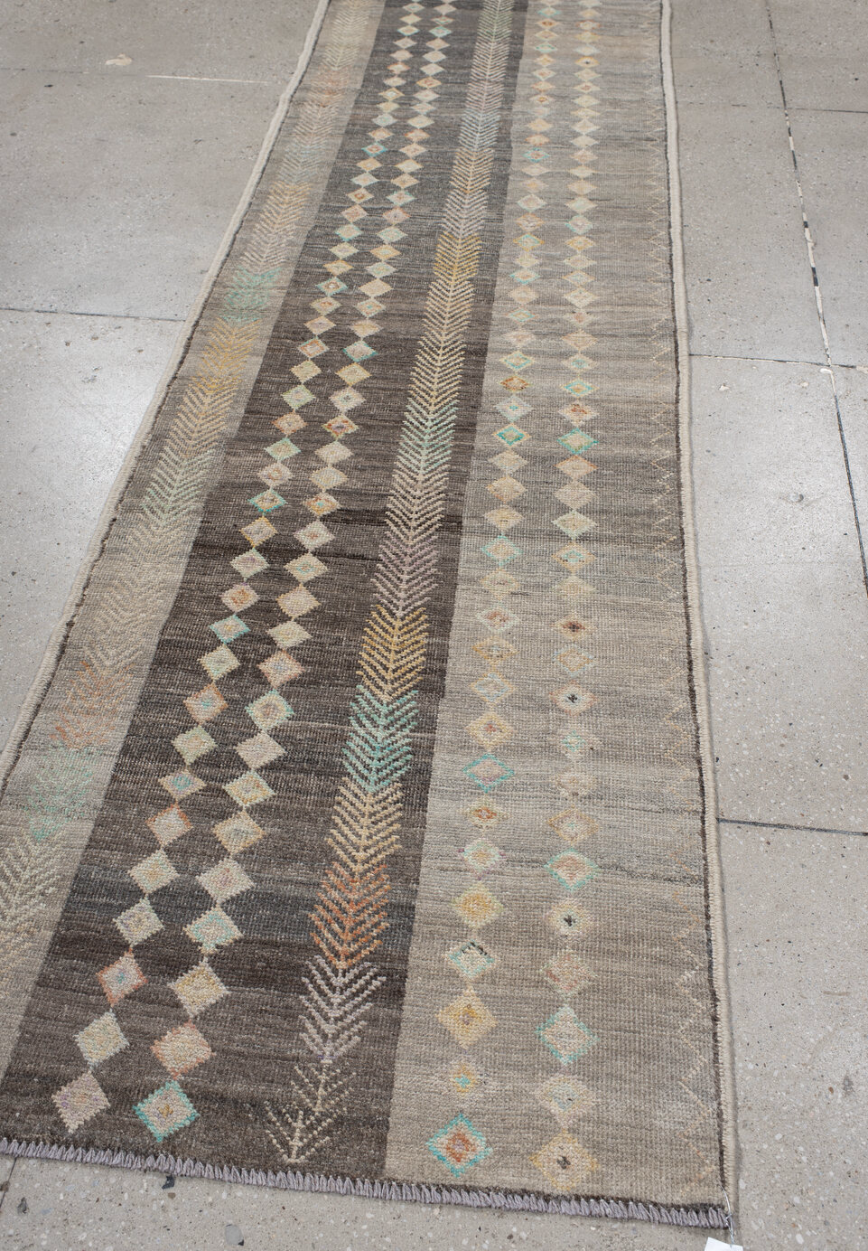 2' x 9' one-of-a-kind handmade vintage Kilim runner rug. Color palette: gray, light gray, off-white, pink, brown, orange