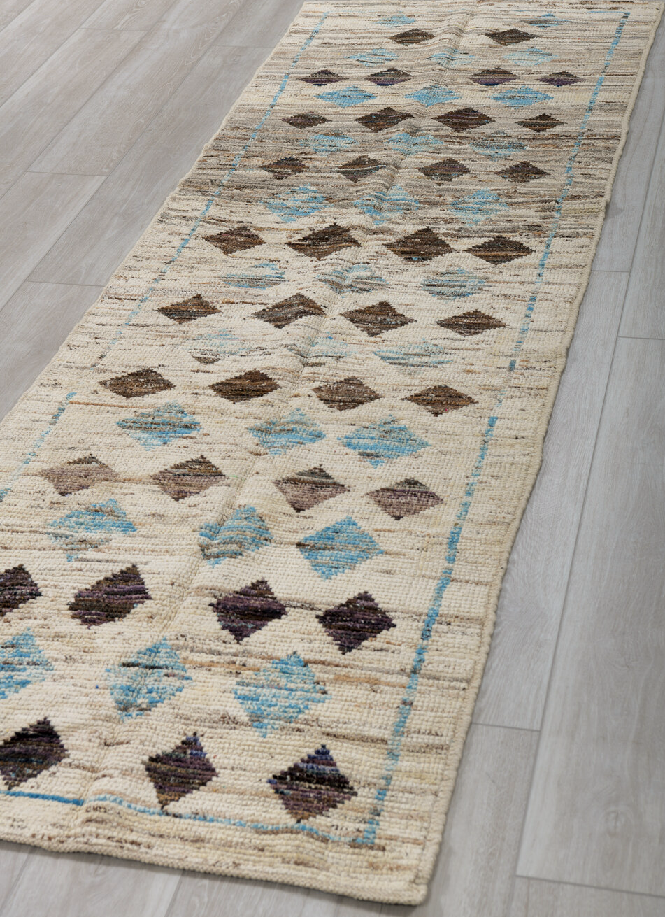 2' x 9' one-of-a-kind handmade vintage Tulu runner rug. Color palette: black, blue, brown, dark gray, fiord, gray