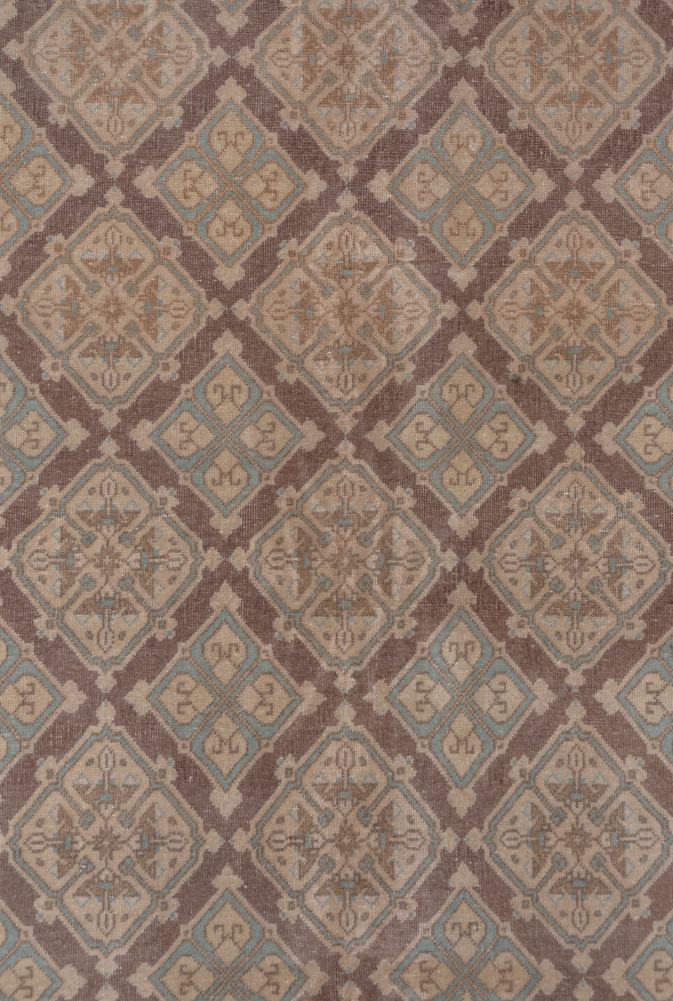 5' x 8' one-of-a-kind handmade vintage Sivas medium size rug. Color palette: brown, gray, light gray, pink