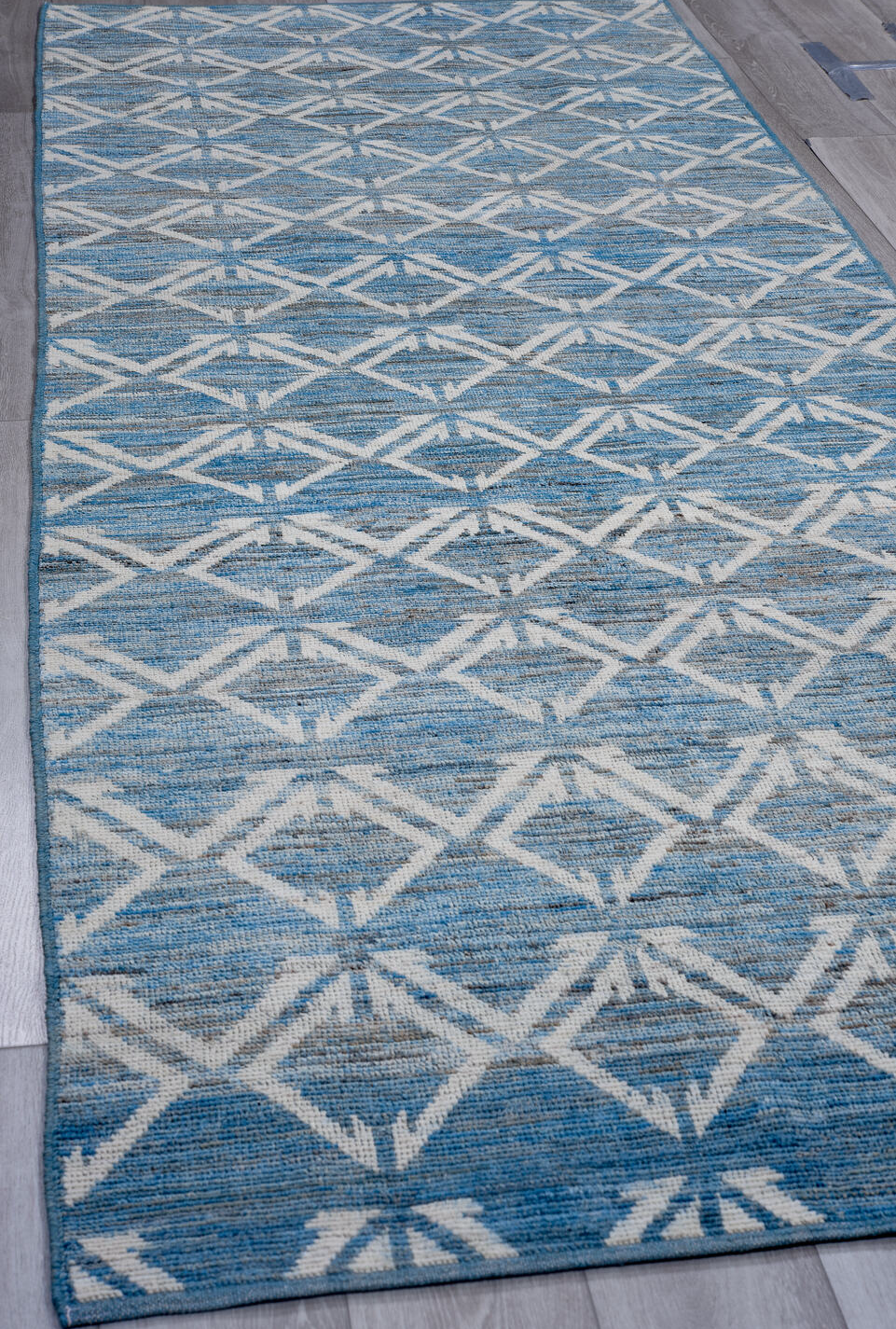 4' x 11' one-of-a-kind handmade vintage Tulu runner rug. Color palette: arapawa, blue, gainsboro, gray, light blue