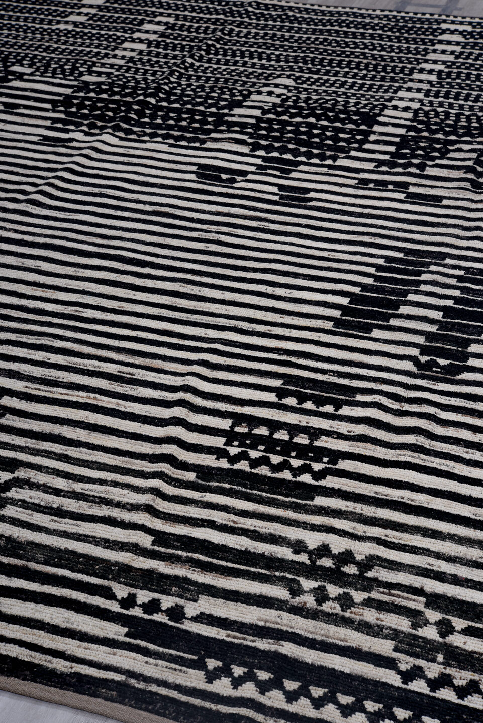 9' x 11' one-of-a-kind handmade vintage Tulu large size rug. Color palette: black, blue, charcoal, dark gray, gray