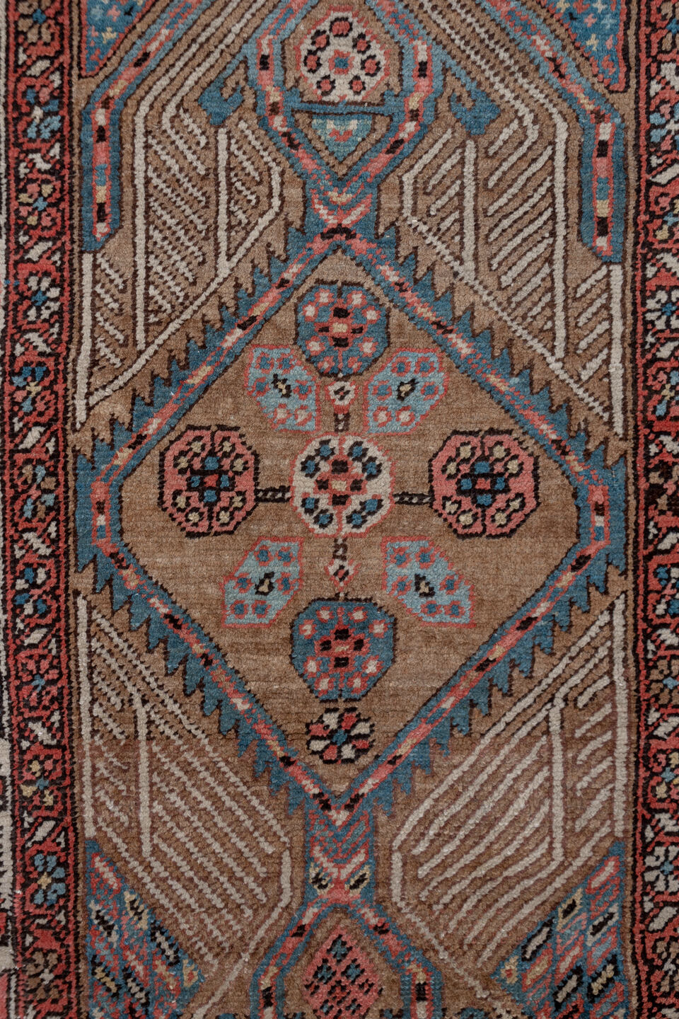 3' x 18' one-of-a-kind handmade vintage Serapi runner rug. Color palette: blue, brown, gray, off-white, pink, red, redwood