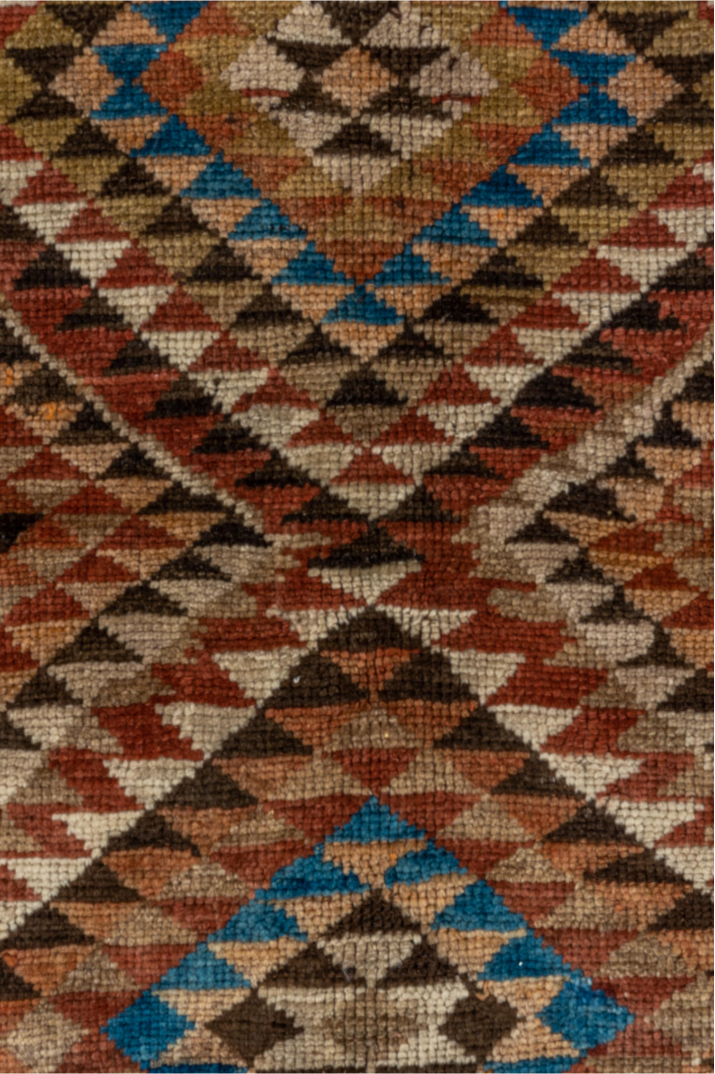 4' x 9' one-of-a-kind handmade vintage Kurd runner rug. Color palette: arapawa, blue, brown, gray, light gray, pink
