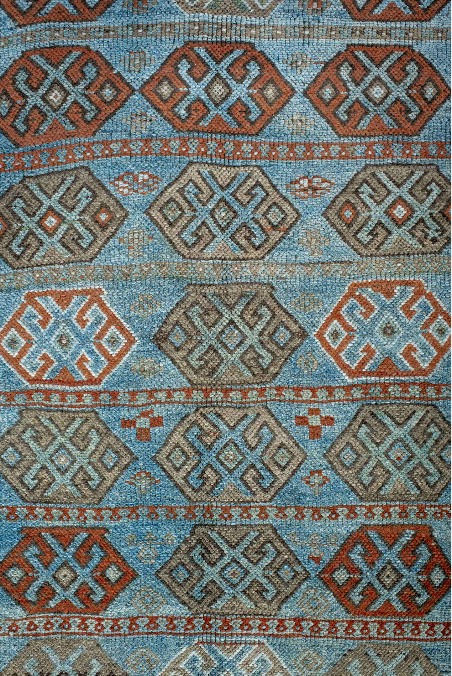 4' x 8' one-of-a-kind handmade vintage Kurd runner rug. Color palette: brown, blue, gray, light gray, light blue, black