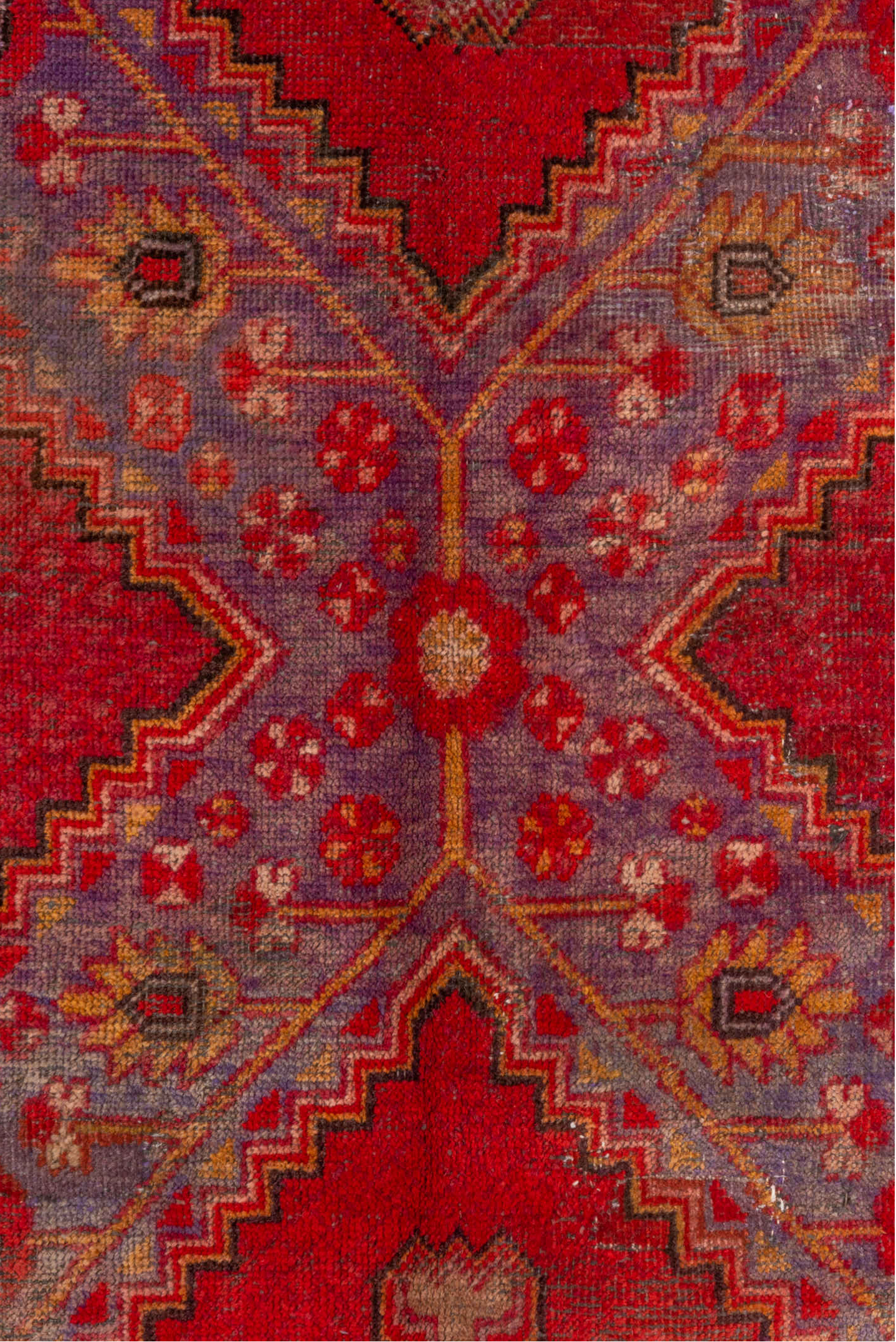 5' x 12' one-of-a-kind handmade vintage Khotan rug. Color palette: brown, fire brick, pink, red, redwood, wine