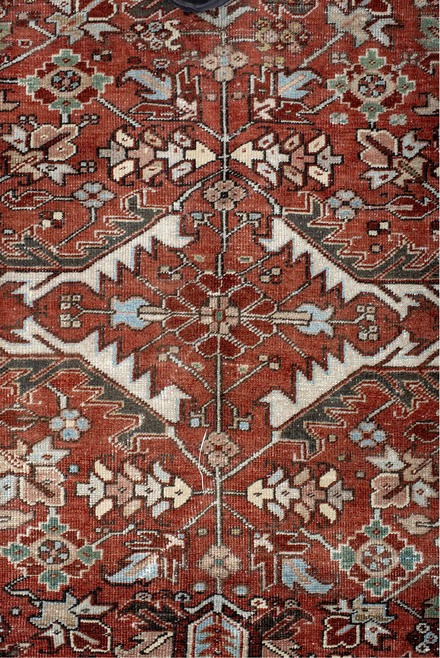 7' x 10' one-of-a-kind handmade vintage Heriz large size rug. Color palette: black, blue, brown, charcoal, dark gray