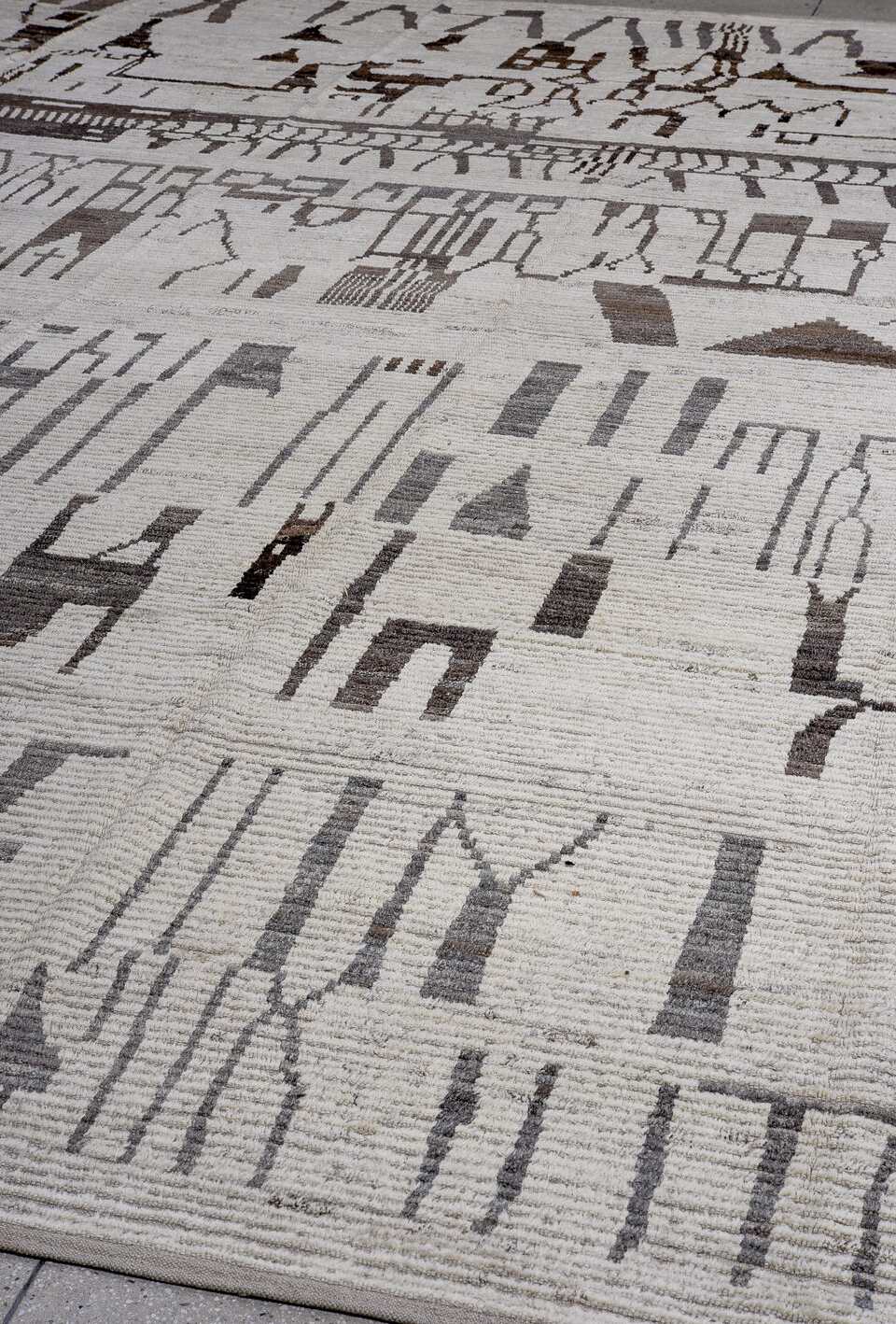 13' x 16' one-of-a-kind handmade vintage Tulu oversize rug. Color palette: brown, gray, light gray, pink, redwood