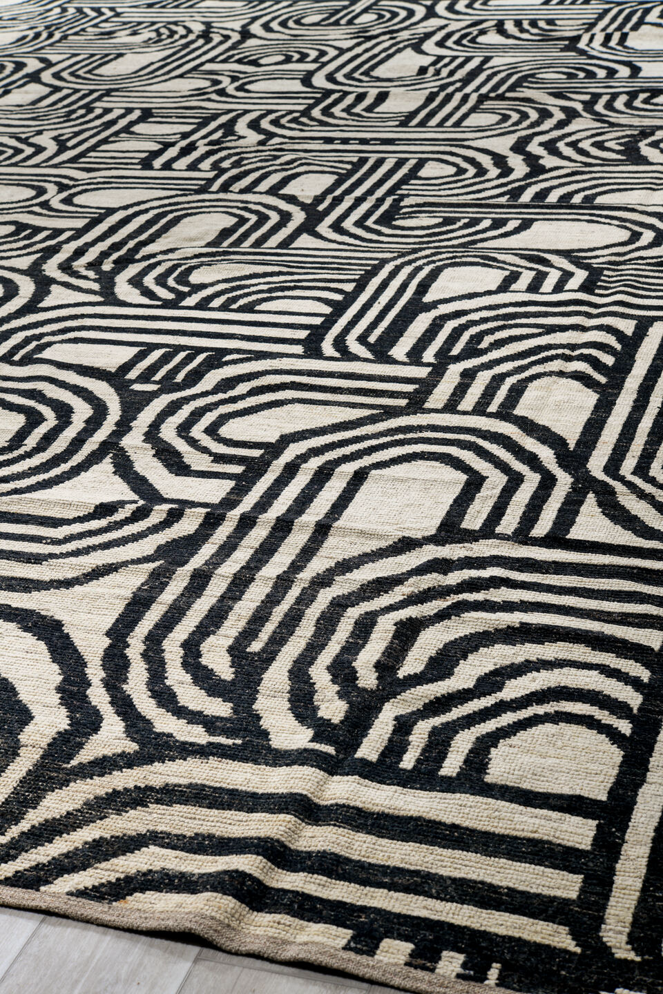 16' x 21' one-of-a-kind handmade vintage Tulu oversize rug. Color palette: black, blue, brown, charcoal, dark gray, gray