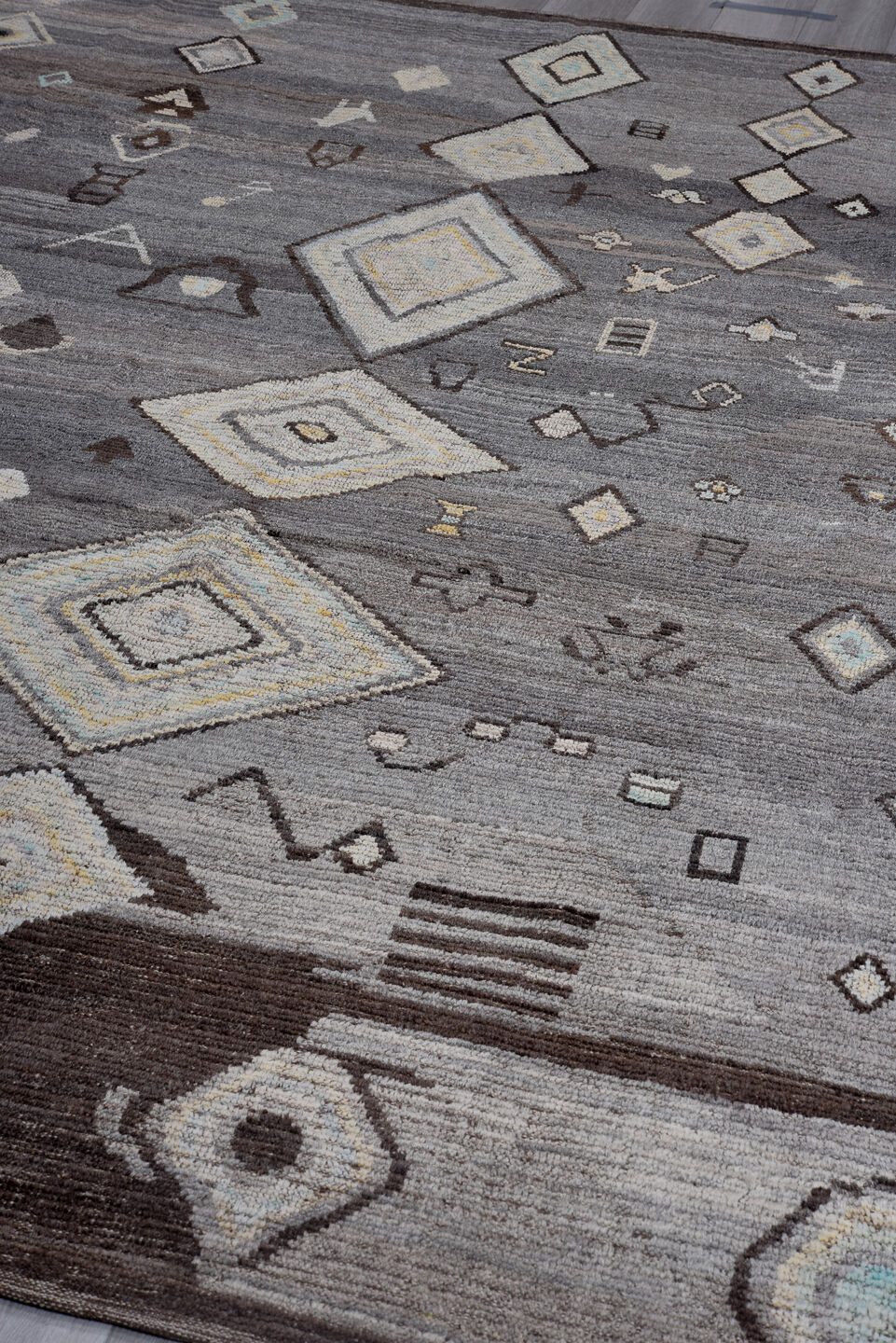 9' x 11' one-of-a-kind handmade vintage Tulu large size rug. Color palette: black, blue, brown, charcoal, dark gray