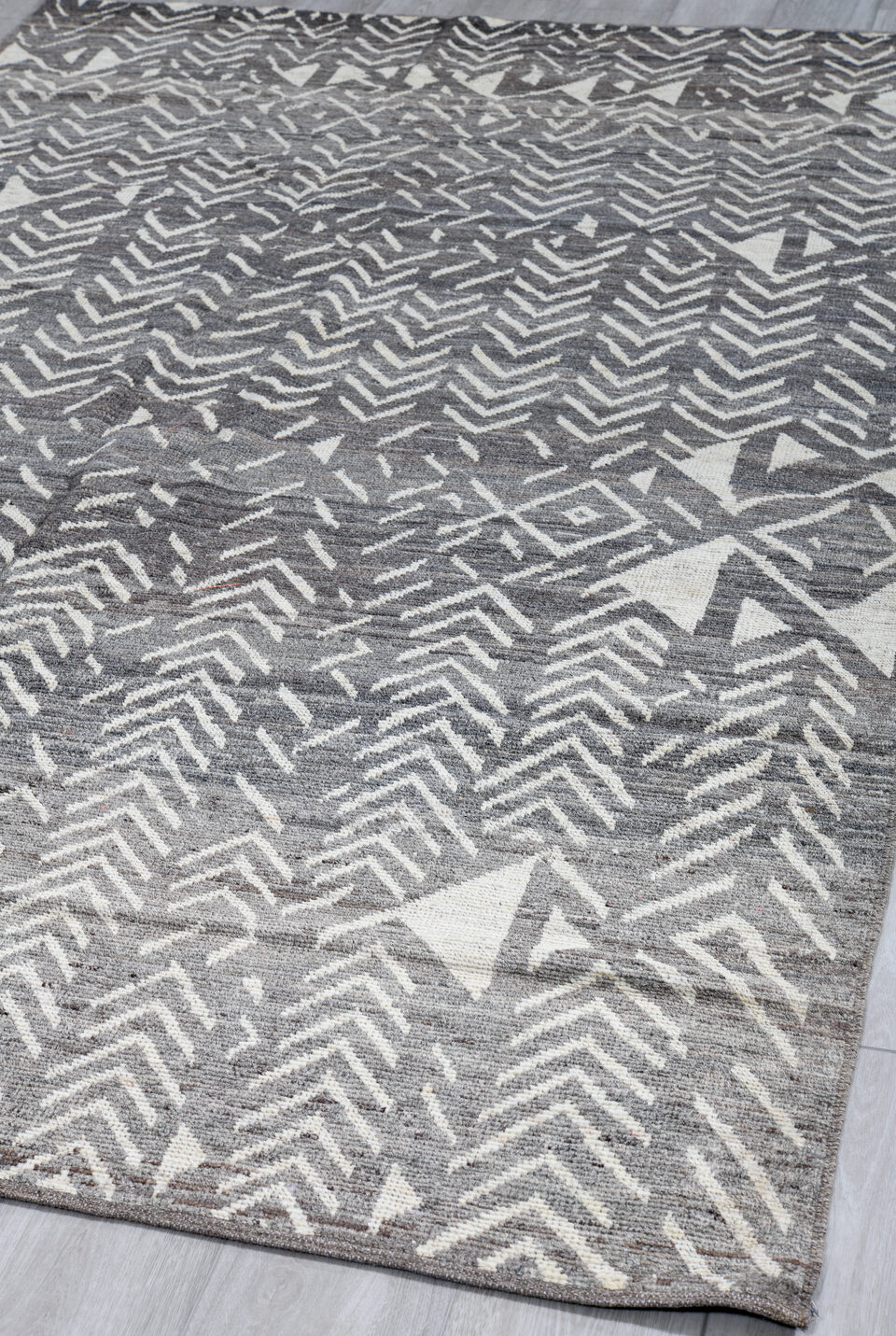 5' x 9' one-of-a-kind handmade vintage Tulu medium size rug. Color palette: black, dark gray, dim gray, gainsboro, gray