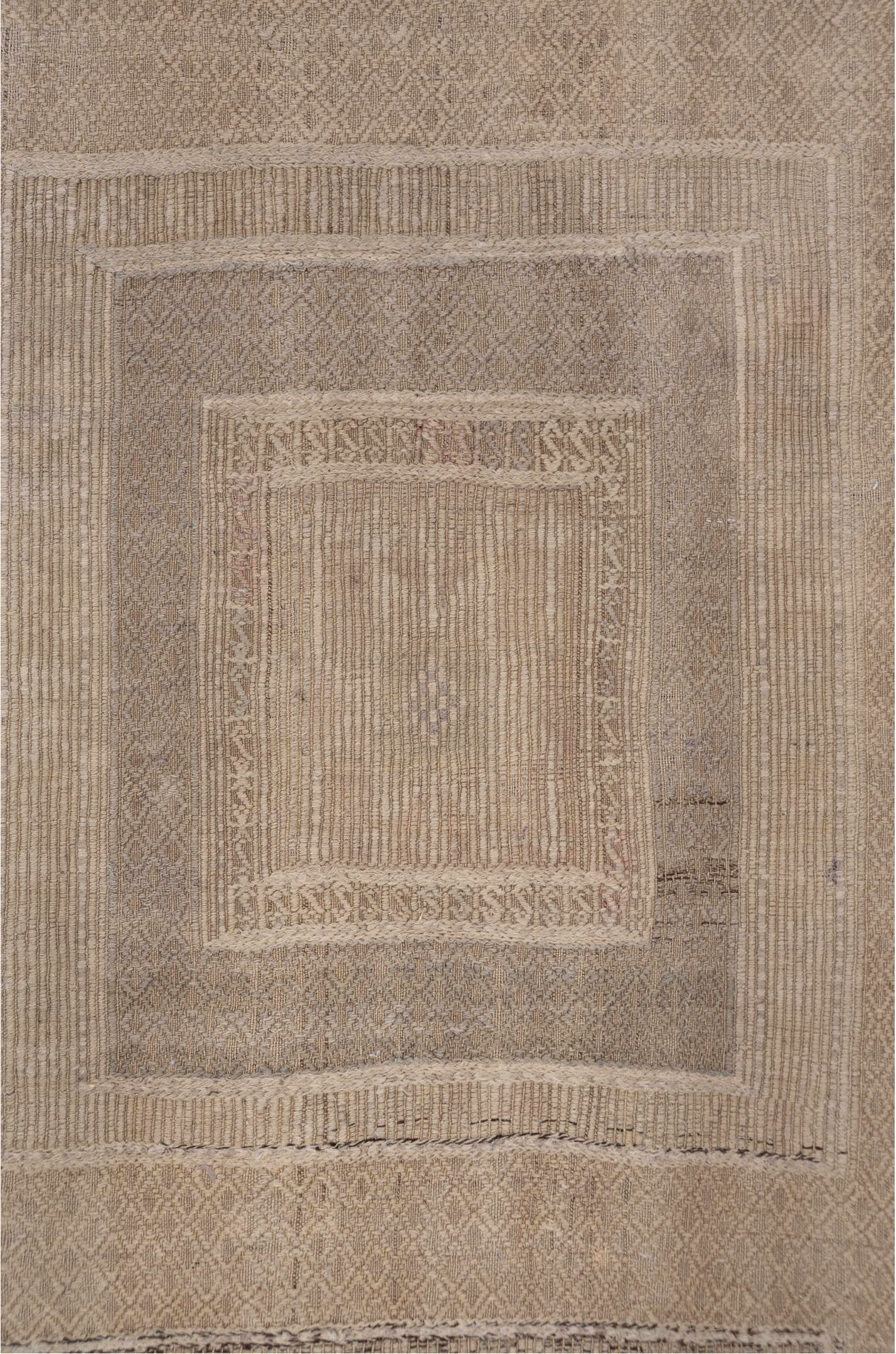 5' x 9' one-of-a-kind handmade vintage Jijim medium size rug. Color palette: gray, light gray, off-white, pink, snow, white