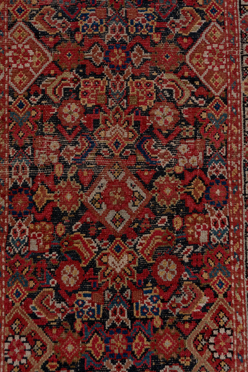 3' x 12' one-of-a-kind handmade vintage Malayer runner rug. Color palette: brown, gray, orange, pink, red