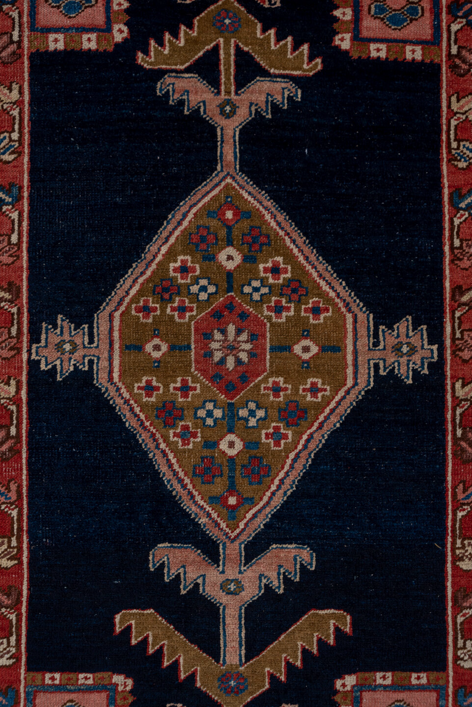 3' x 11' one-of-a-kind handmade vintage Serapi runner rug. Color palette: blue, brown, gray, pink, red