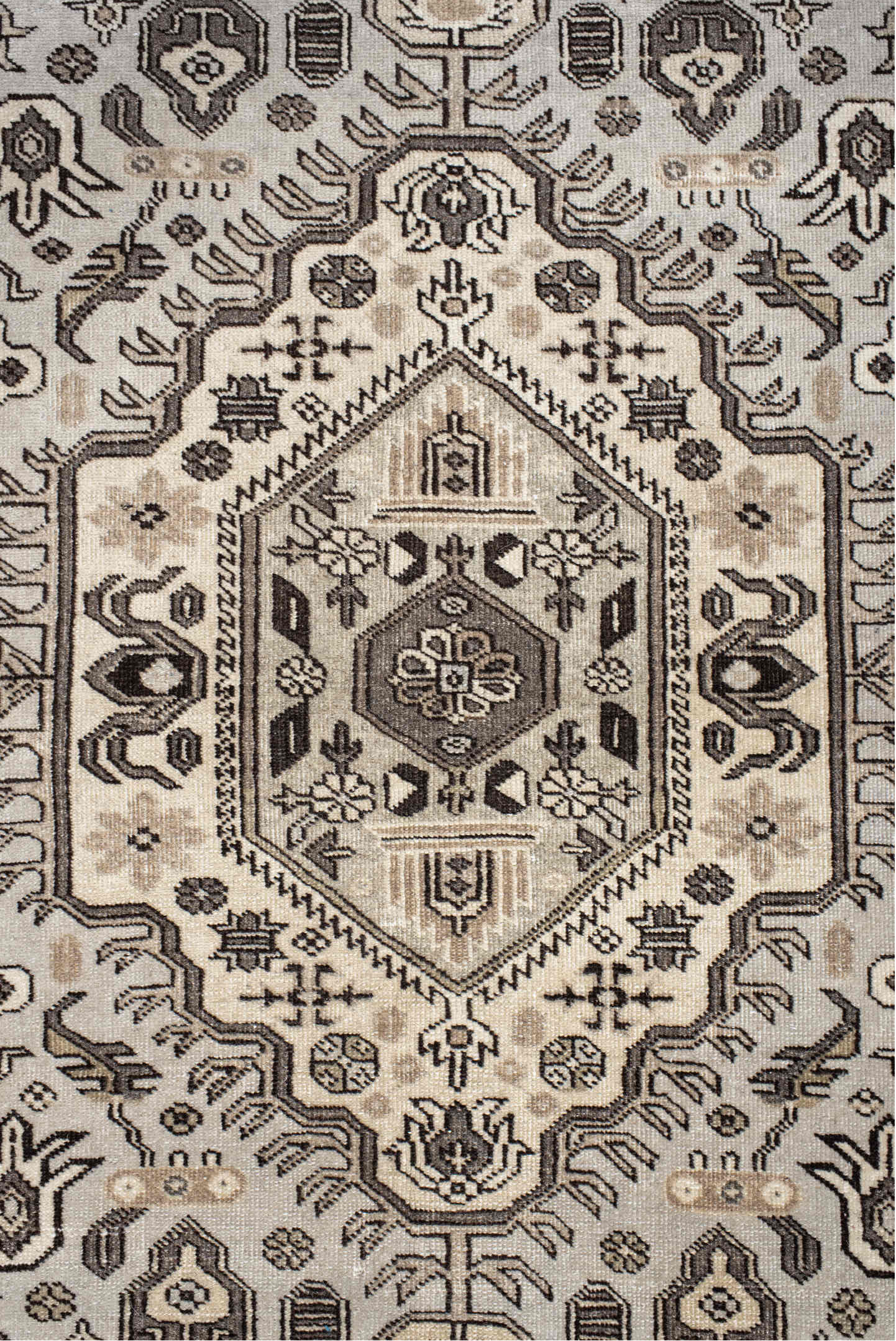 5' x 8' one-of-a-kind handmade vintage medium size rug. Color palette: antiquewhite, black, gray, light gray, misty rose