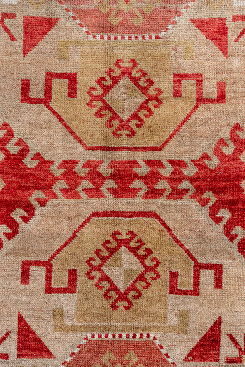 4' x 7' one-of-a-kind handmade vintage Caucasian rug. Color palette: brown, gray, light gray, off-white, pink, red