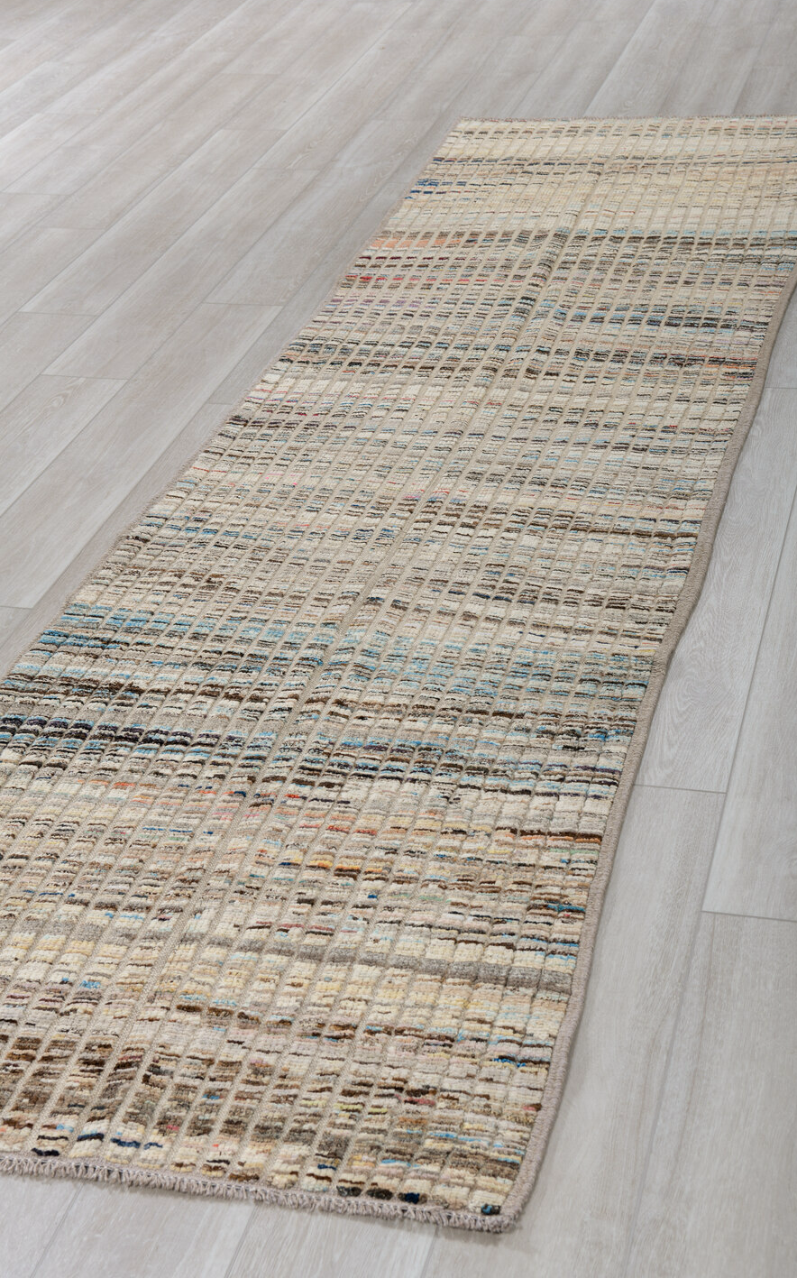3' x 11' one-of-a-kind handmade vintage Tulu runner rug. Color palette: black, blue, brown, dark gray, gray, light gray